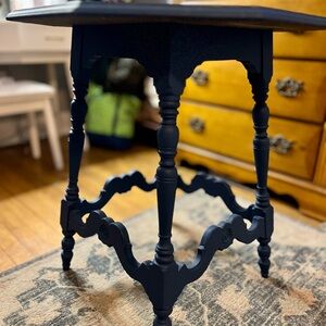 Navy Blue Ornate Accent Table with Curved Legs and X-Shaped Base
